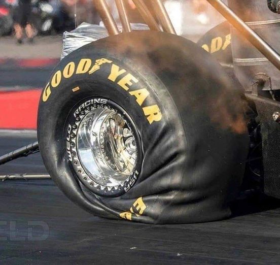 This is what 11,000 horsepower does to a top fuel dragster tire at launch!